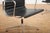 Vitra Swivel Chair EA 104 in Chrome-Plated Aluminum and Black Leather Upholstery by Ray and Charles Eames for Vitra, 1958 For Sale - Image 4 of 18