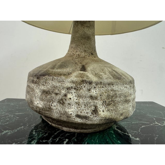 1960s Ceramic Table Lamp This ceramic table lamp from the 1960s embodies a rustic yet modern design typical of mid-century...