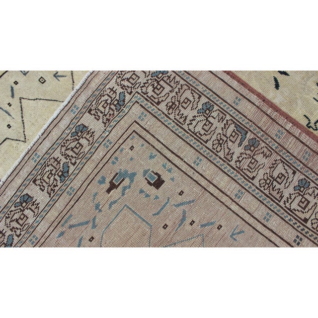 Textile Vintage Oushak Rug With Soft Beige, Warm Taupe, and Deep Navy Blue Accents For Sale - Image 7 of 8