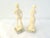 Stylish pair of cream-shaded molded resin reproductions/figurines of Michael Angelo's "David" and Greek mythology's "Venus...