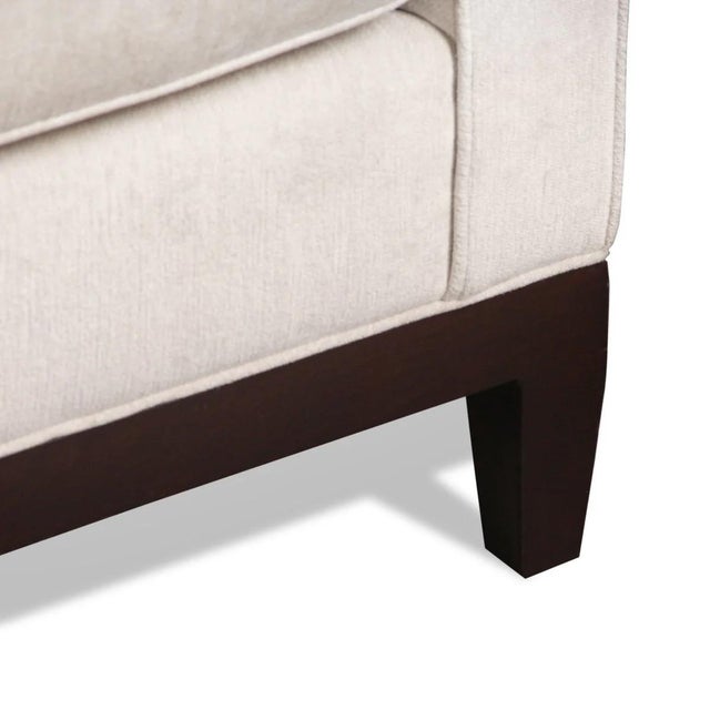 A beautiful mid-century modern, newly upholstered sofa in the Manner of Émile Jacques Ruhlmann in grey Romo Helix Moonbeam...