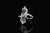 Top quality certified 18K solid white gold 1.40CTS diamond and sapphire filigree cocktail ring. This elegant ring features...