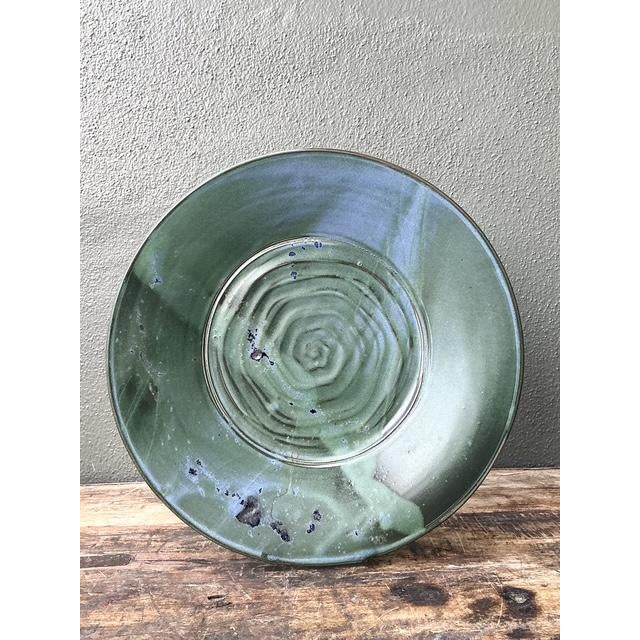 This original studio pottery platter is a masterwork of Organic Modernism, showcasing a mesmerizing hand-thrown concentric...