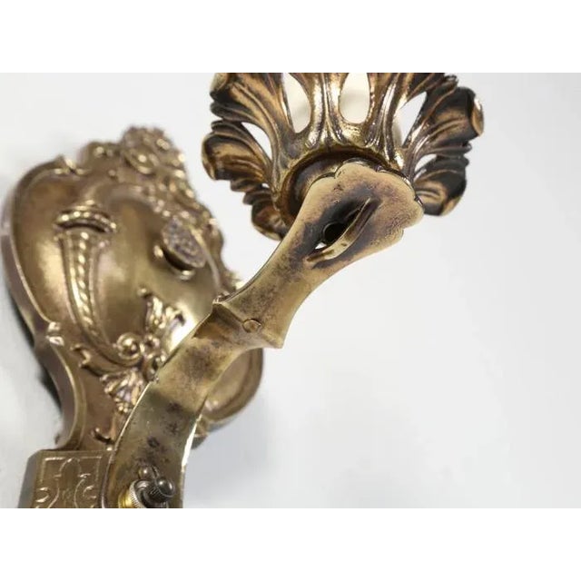 Single American brass sconce, that we removed from a local North Shore home, in working condition. The heavy weight would...