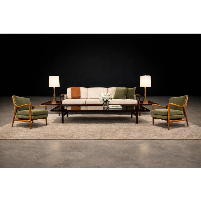 A compelling pair of neoclassical table lamps distinguished by their architectural presence and richly modeled bronze...