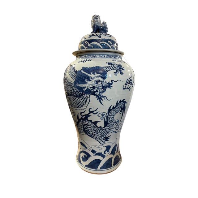 Superb hand painted mansion size ginger jar depicting dragon and phoenix for good luck , a foo dog handle. Ancient Chinese...