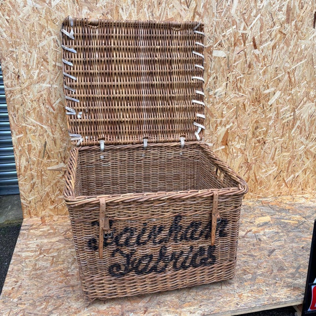1920’s original english wicker baskets. Oversized industrial storage baskets retaining original faded branding. Handmade...