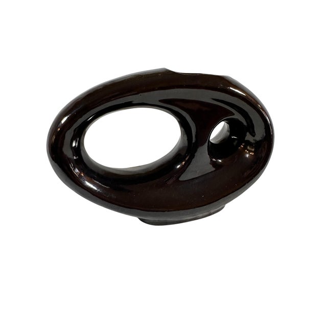 Likely Toyo Ikebana Black Glossy Terracotta Vase The oval geometric minimalist vase measures 7 1/2" wide x 5"' tall with...