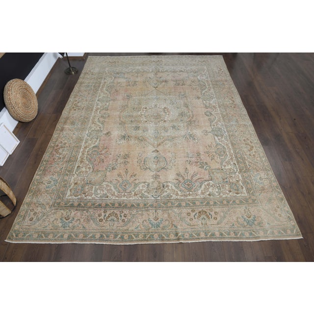 Vintage Persian Hand-Knotted area rug is a semi-antique vintage area rug. The '70s Eastern region of Anatolian's unique...