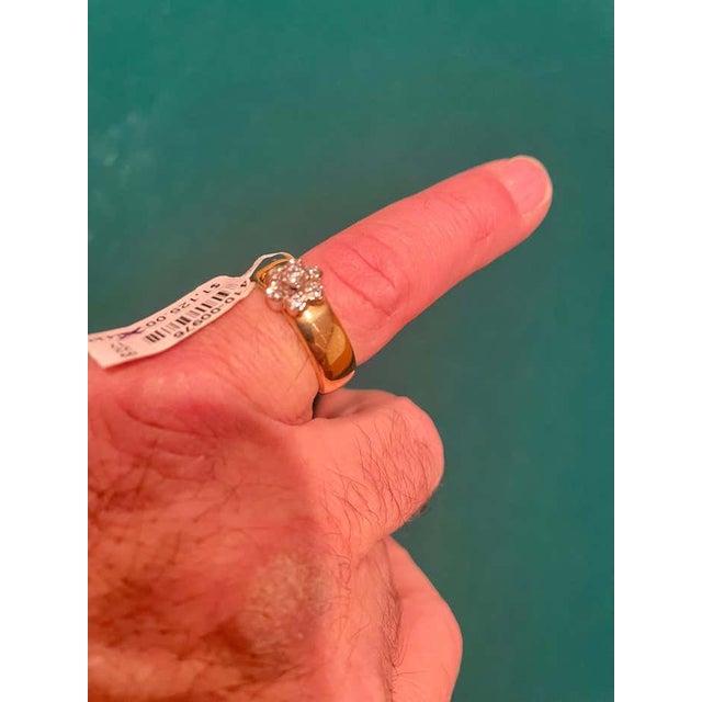 14 Karat Two Tone Yellow And White Gold With Diamond Flower Ring /Band 0.50 Total Diamond Weight. Size 6 8.60 grams total...