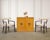 A sculptural set of four exceptionally rare mid-century modern walnut klismos dining armchairs designed by T.H. Robsjohn-...