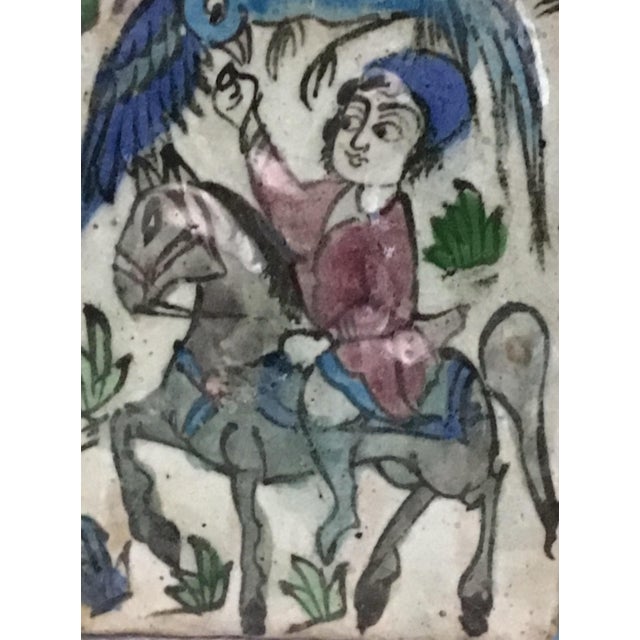 Antique 19th-Century Persian Qajar Dynasty Polychrome Tile – Falconer on Horseback This striking 19th-century ceramic tile...