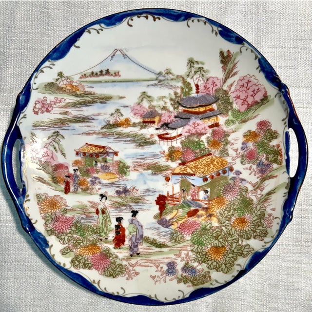 Offered is a beautiful set of seventeen (17) hand painted plates, bowls, and a moriage tray made in Japan circa 1920....