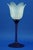 Item : A stunning tulip-shaped vase in Murano glass, two-tone, with a blue stem or pedestal and an opaline white flower....