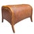 A vintage barrel form rattan ottoman featuring handwoven construction and a warm honey-toned finish. The sculptural...