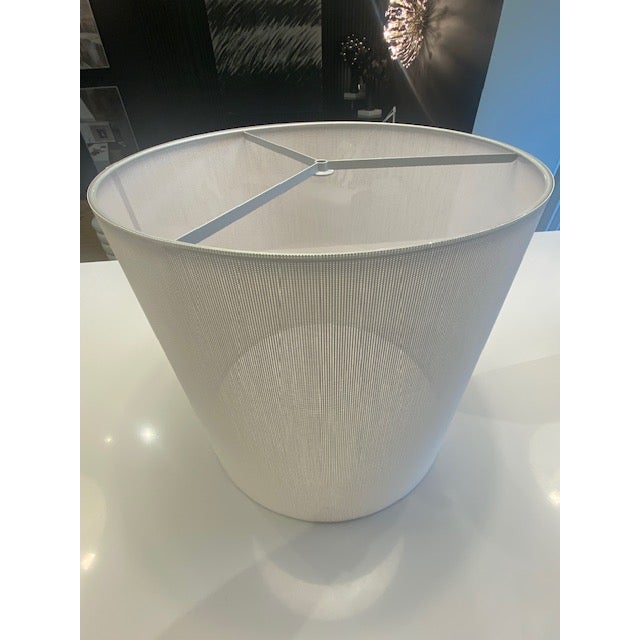 Elevate your interior lighting with the timeless design of the Moare lamp shade. Featuring a sophisticated, translucent...