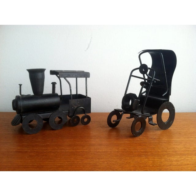 Pair of vintage folk art figures, train and buggy car, fashioned from wire, nuts and bolts etc. Charming industrial mantel...