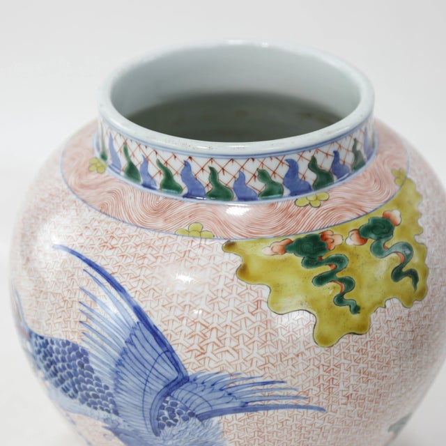 White Pair of Chinese Late Qing Dynasty, Jingdezhen Kiln, Famille Verte Covered Jar With Kirin and Phoenix on Iron-Red Brocade Ground For Sale - Image 8 of 16