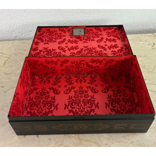 This is an American maid hand painted toleware box. This hand painted box features a solid brass handle at the top with a...