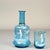 Water carafe with a glass made of beautifully colored blue glass, hand-painted decoration, ,,Mary Gregory'' glass refers...