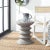 Give outdoor entertaining spaces an artistic sense of motion with this Benaya Accent Stool. Confident and captivating,...