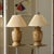 These lamps feature a sophisticated urn-shaped silhouette meticulously crafted with a decorative braided herringbone...