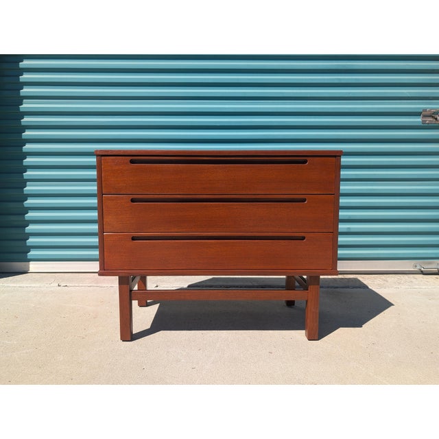 A refined Mid-Century Modern three-drawer chest by Nils Jonsson, dating to the 1960s and showcasing the clean lines and...