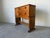 A distinctive 1940s Art Deco solid oak cabinet featuring a warm honey-toned finish and beautiful oak grain throughout....