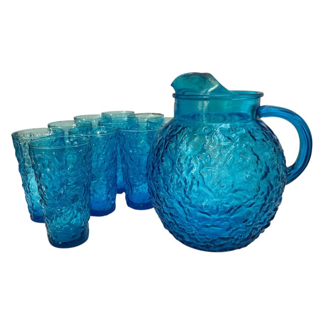1970s Anchor Hocking Lido Milano azure blue pitcher with 10 glasses in mint condition. It’s hard to find a more perfect...