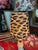 A Leopard print clip top handmade chandelier shade.measurements: top 3” bottom 4” side4”