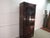 Item 87373: Statton solid cherry bookcase cabinet. Age: 1980's. Details: Glass shelves, a lighted interior and Old Towne...
