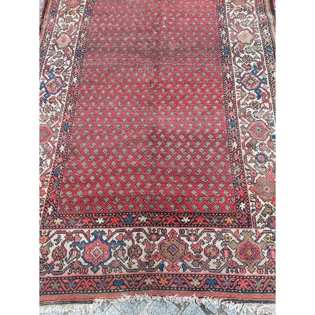 Nice late 19th century large Malayer runner with nice stylized design with small Botteh on a red field and beautiful...