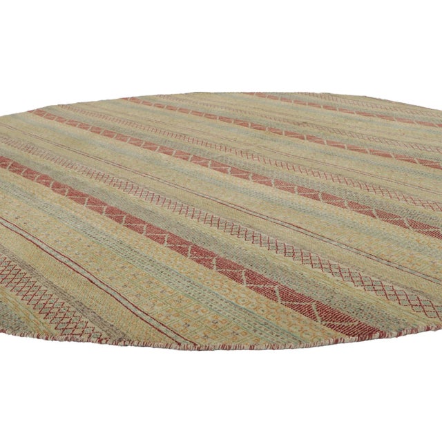 30301 Striped Round Area Rug with Modern Style 07'09 x 07'10. This hand-knotted wool round area rug features a striped...