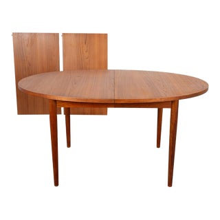 1970s Mid-Century Teak Round Oval Extendable Dining Table For Sale