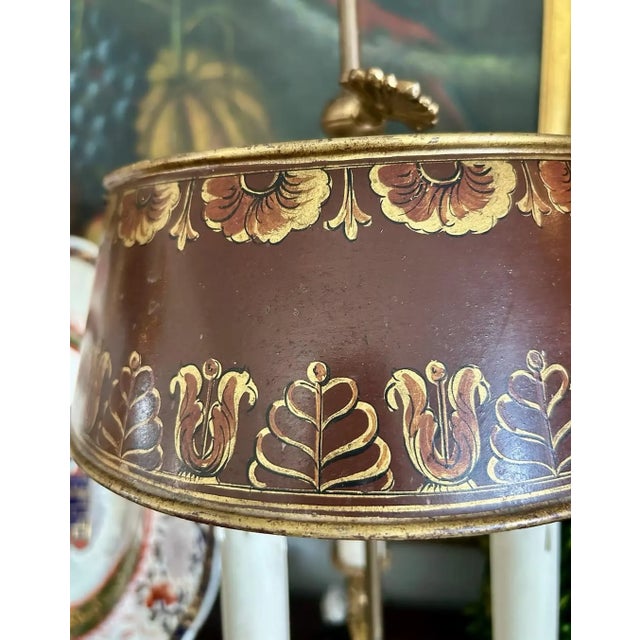 A classic vintage French Empire style bouillotte lamp, dating to early to mid 20th century. This elegant table lamp...