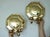 Pair of Swedish Brass Octagonal Double Arm Sconces Elegant Swedish brass wall sconces with a rare octagonal backplate and...