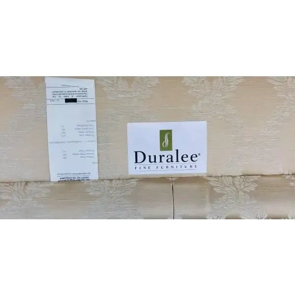 Featured is stately golden Tuscany Collection button tufted back sofa with button pleated waterfall skirt and spring down...