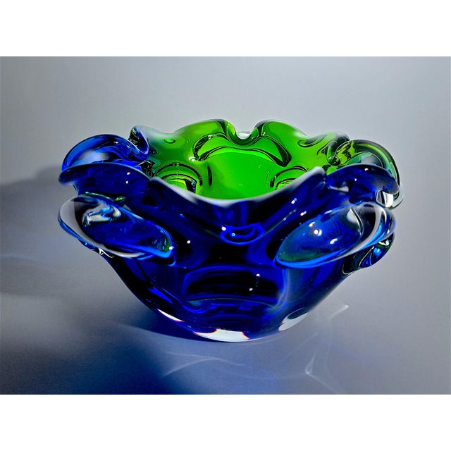Authentic Murano glass bowl and emptier, vintage from the 1970s. This bowl features a striking combination of blue and...