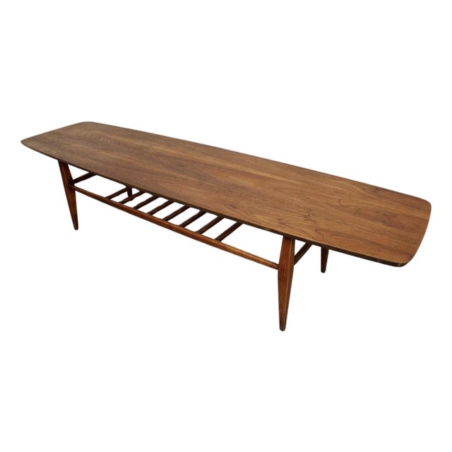 Mid 20th Century Walnut Surfboard Coffee Table With Spindled Shelf For Sale