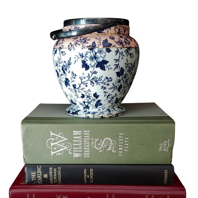 A stunning example of late Victorian tableware, this antique English biscuit jar (circa 1890s). The original silverplated...