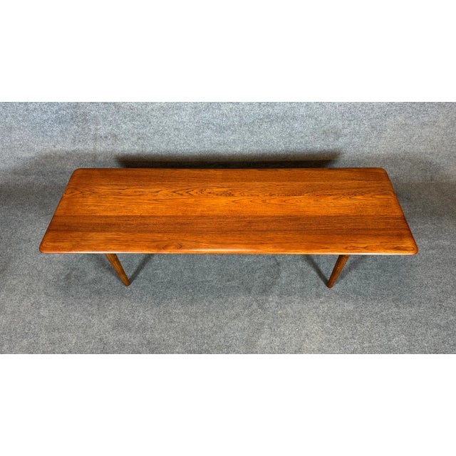 Here is a beautiful scandinavian modern cocktail table part of the "Minerva" collection of France and Son designed by...