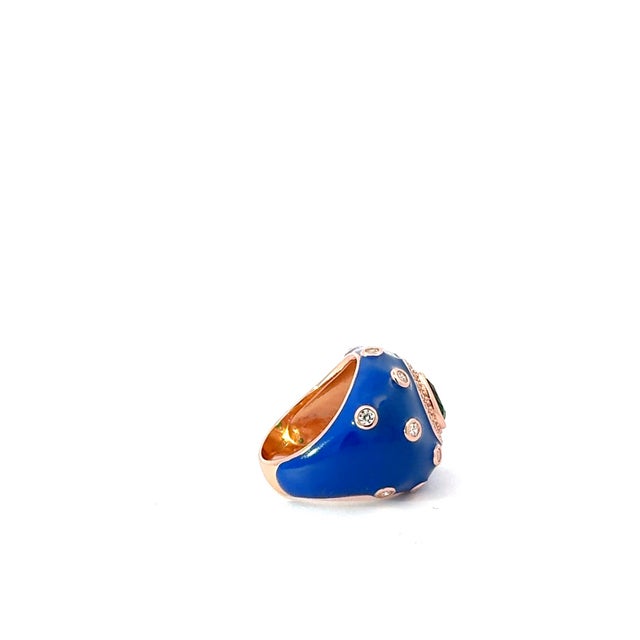 Make a bold statement with this stunning 925 sterling silver ring, featuring a rich cobalt blue enamel dome design. At its...