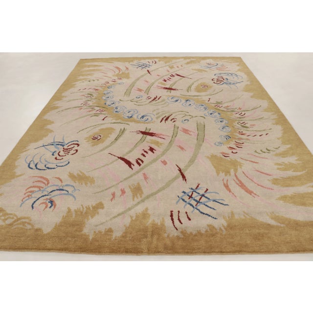 Hand-knotted in wool, this contemporary 9x12 rug is a refined addition to Rug & Kilim's Art Deco collection. The design...