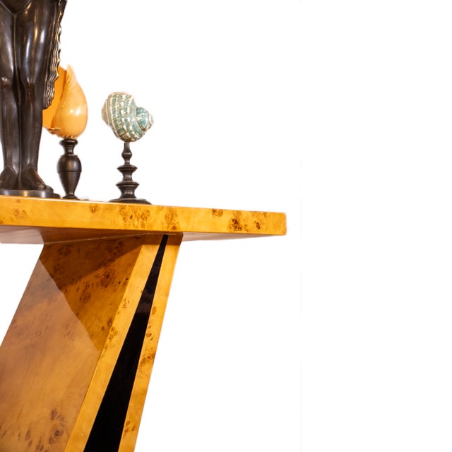 A refined Art Deco console table for today’s interiors, with the iconic V-shaped silhouette and elegant contrast of burl...