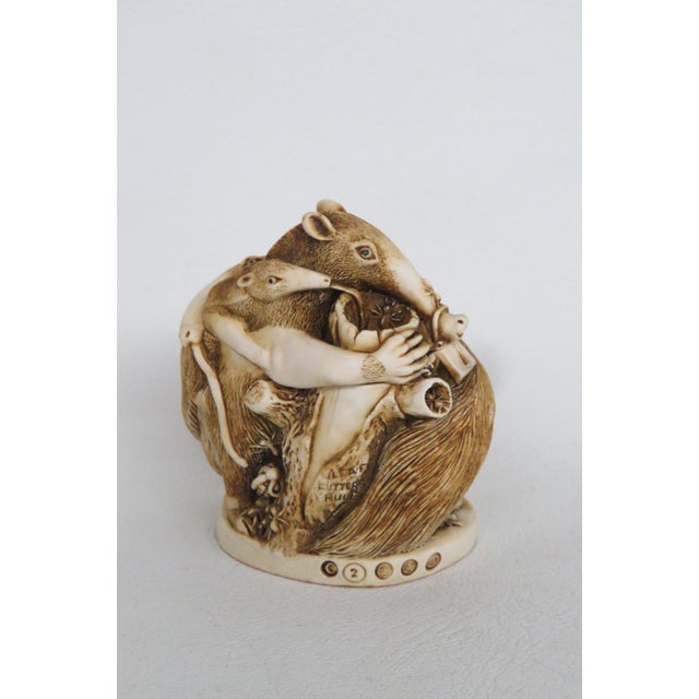 This lovely Box Figurine is made out of crushed marble and polymer resin. This beautiful figurine is carved to resemble a...