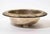 Striking modernist silver bowl featuring a broad rolled rim and sculptural hemispherical form. The minimalist design is...
