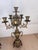 Striking coordinating pair of substantial vintage six-light candelabra in an elaborate Rococo Revival style. The two...
