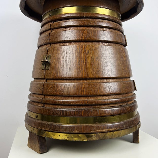 Vintage coopered oak bar cabinet in the shape of a barrel