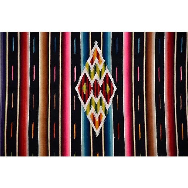 Saltillo serape of very finely woven wool with silk in the center medallion Ojo de Dios and decorative side bars, cotton...