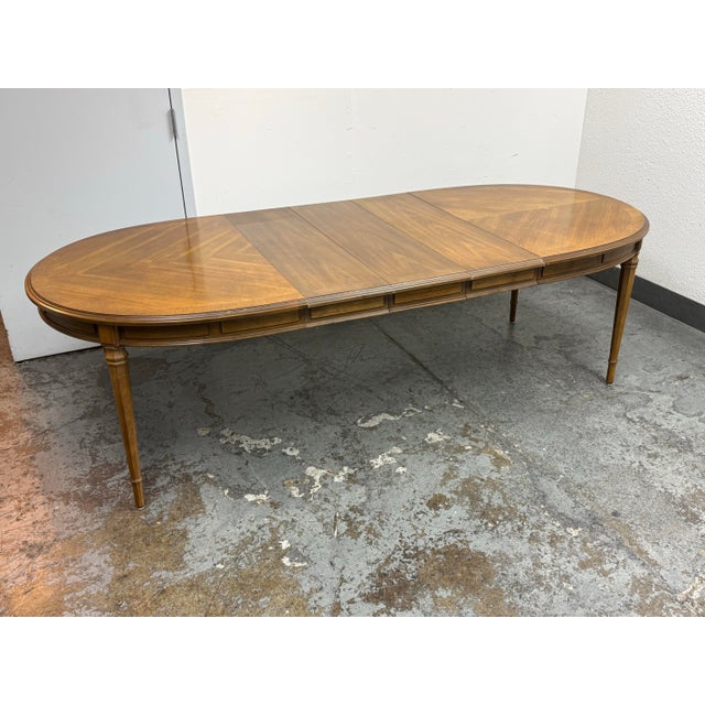 Design Plus Gallery presents the Esperanto Extension Dining Table from Drexel. This American-made table belongs to...